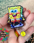Sample product created with Sponge Bob Decal & Acrylic Blank Combo. Glitter Crafting, Badge Reels